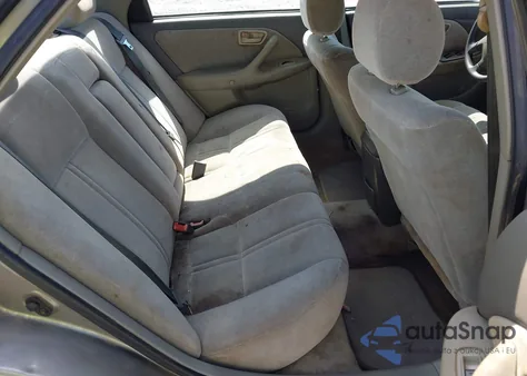 1999 Toyota Camry Le z USA, uszkodzony, nr VIN 4T1BG22KXXU525645